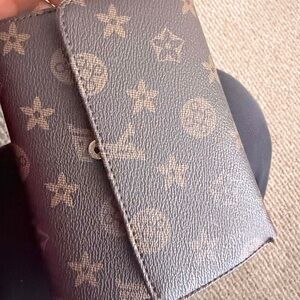 Classic Brown Monogram Wallet with Snap Closure